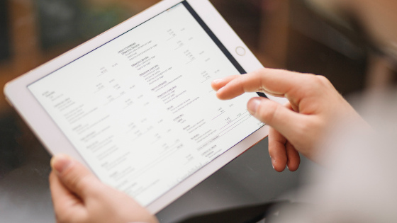 Man reviewing document on a tablet