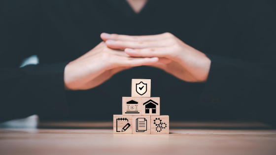 Wood cubes stacking together, with a compliance icon on the top