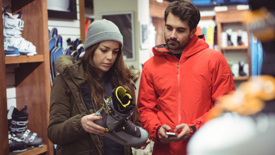 Couple selecting shoe in a shop