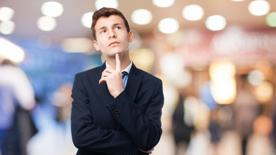 Thinking man in suit