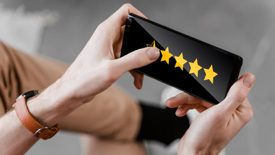 A customer giving rating on a phone